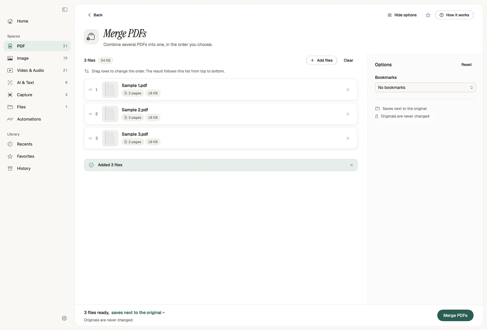 Merge PDFs tool with three PDFs in a reorderable list, a bookmarks option and a Merge PDFs button